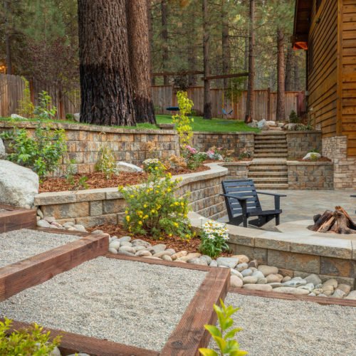 hardscape backyard designs with patio fireplace and stairs