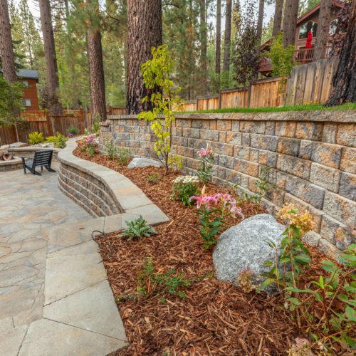hardscape patio with firepit by tahoe outdoor living